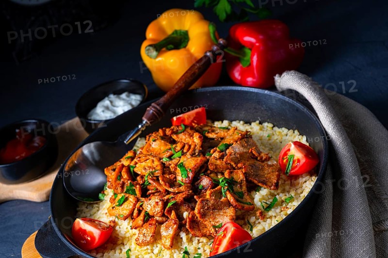 Rustic Wulgur pans with gratinated gyros and yoghurt