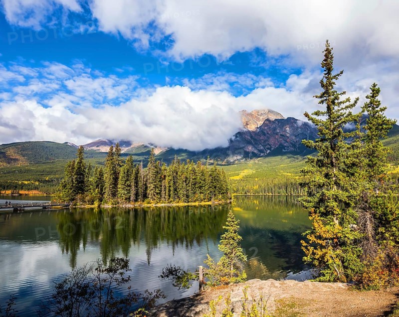 The clear autumn morning in Jasper National Park, Canada. Charming little island in the Pyramid Lake