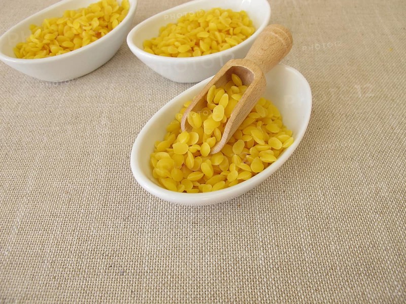 Pure beeswax pastilles for natural cosmetics, candles or beeswax wraps