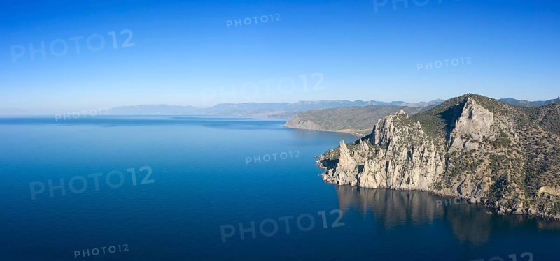 Aerial view of beautiful mountain rocks and sea landscape in Crimea