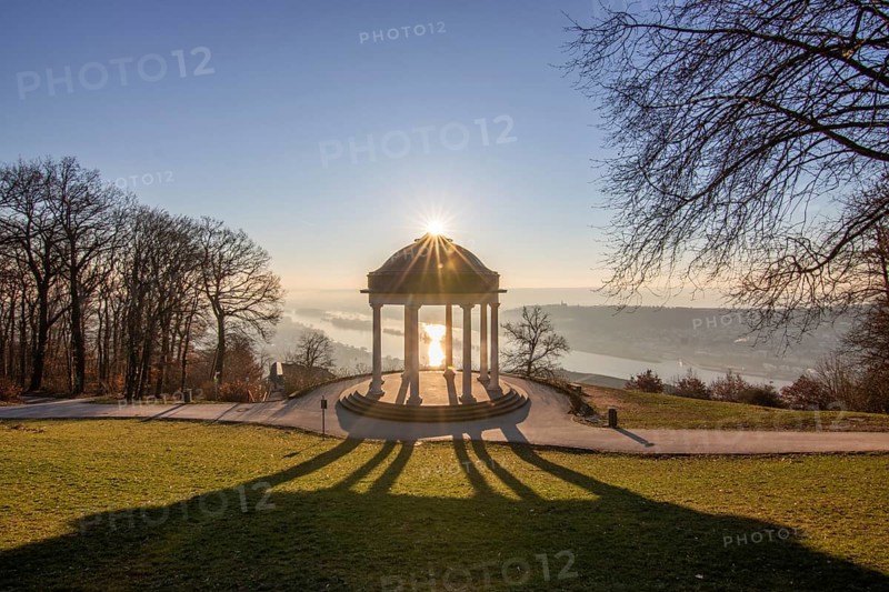 Beautiful temple in a landscape shot. Sunrise on a winter morning. Beautiful view along the Rhine at the Niederwaldtempel, Niederwalddenkmal, Hesse, Germany