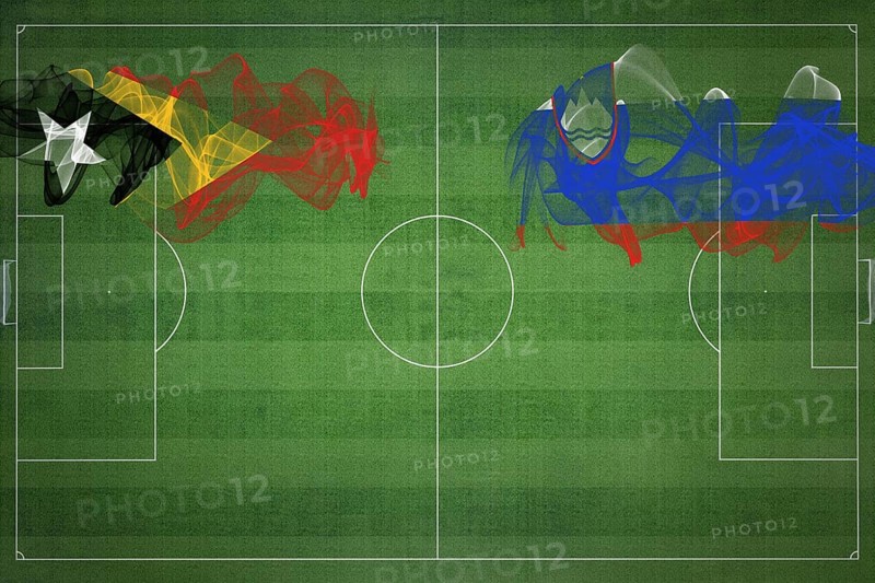 East Timor vs Slovenia Soccer Match, national colors, national flags, soccer field, football game, Competition concept, Copy space