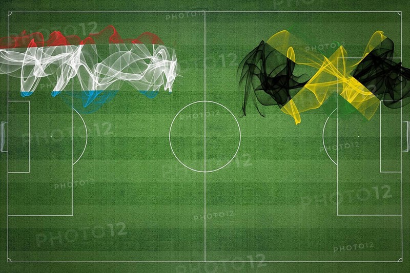 Luxembourg vs Jamaica Soccer Match, national colors, national flags, soccer field, football game, Competition concept, Copy space