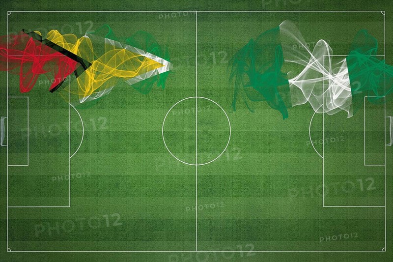 Guyana vs Nigeria Soccer Match, national colors, national flags, soccer field, football game, Competition concept, Copy space