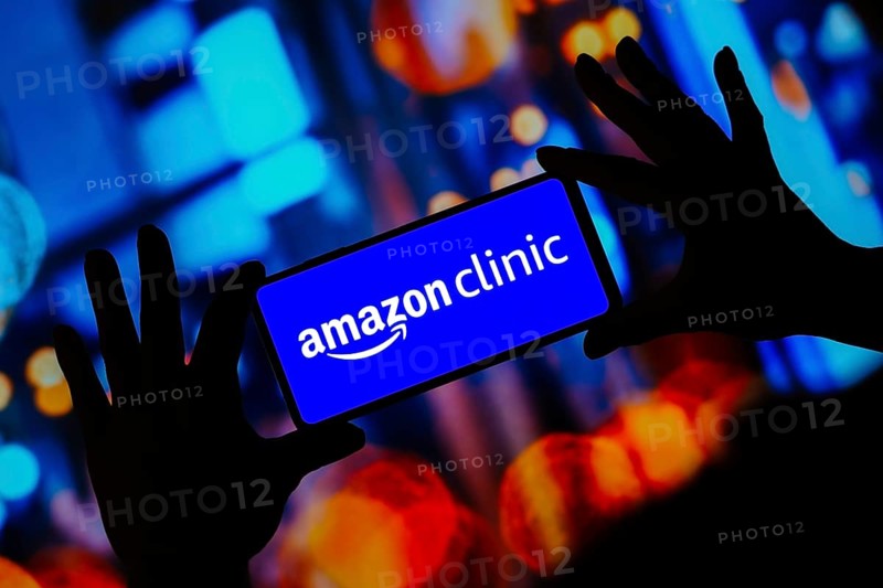 In this photo illustration, the Amazon Clinic logo seen displayed on a smartphone