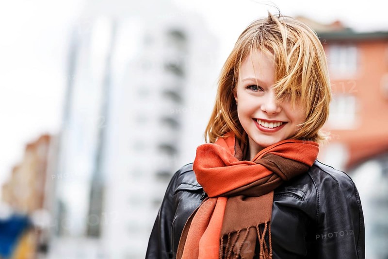 Street portrait of young beautiful fashionable woman. Street fashion concept