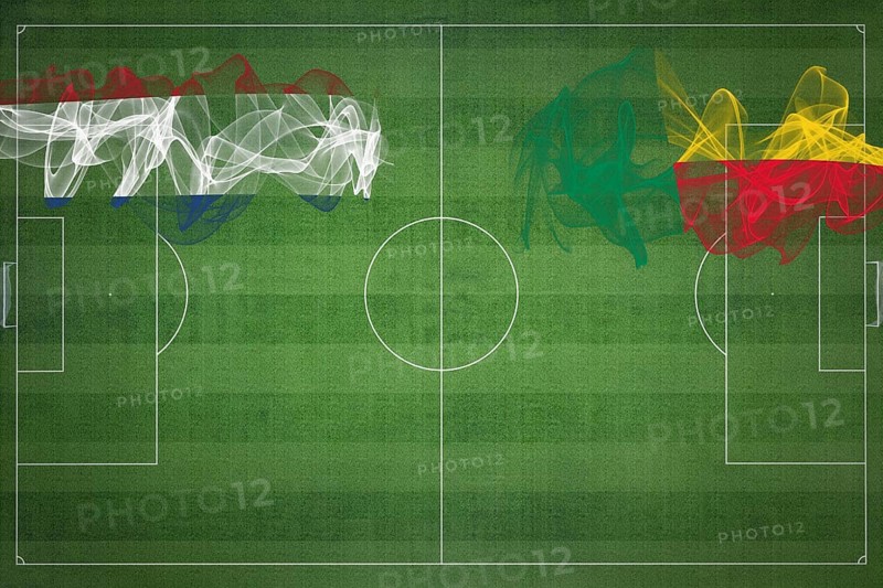 Netherlands vs Benin Soccer Match, national colors, national flags, soccer field, football game, Competition concept, Copy space