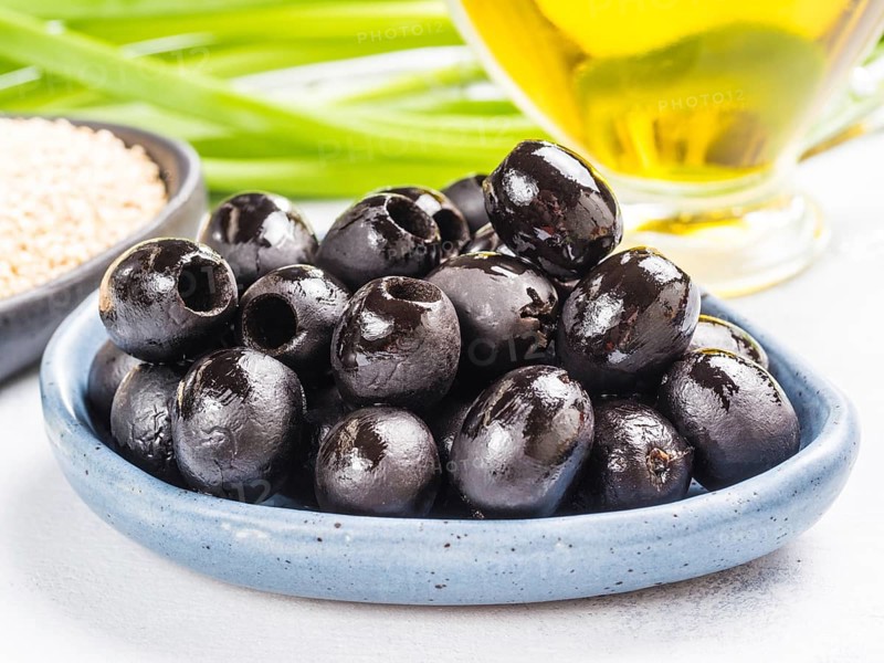 Black olives in blue plate