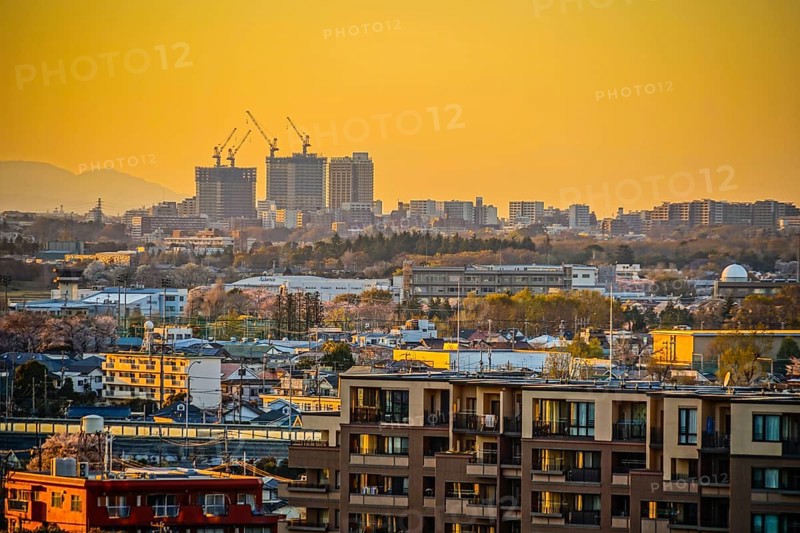 Rooftops of Chofu City, which is wrapped in a sunset. Shooting Location: Chofu, Tokyo