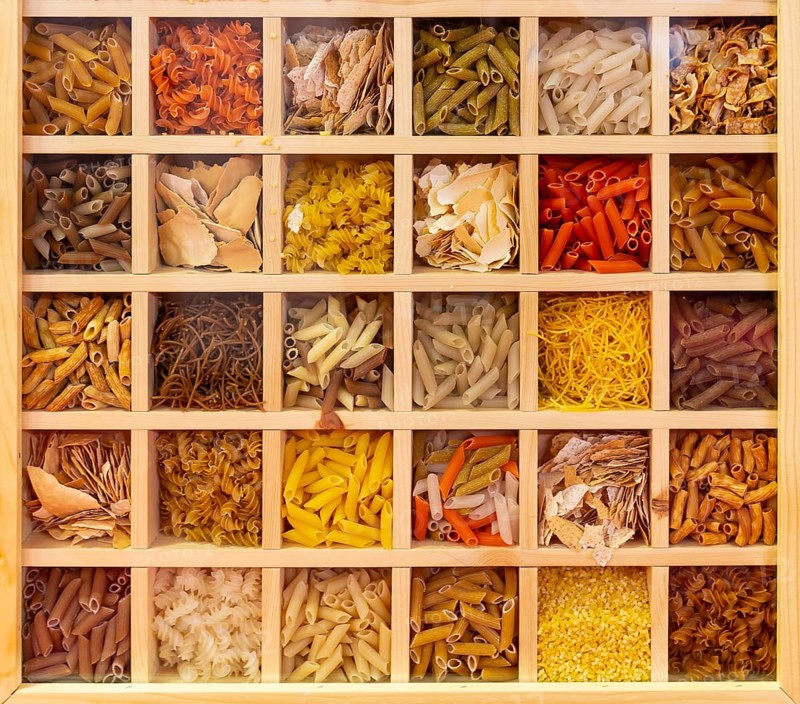 30 types of Italian pasta collection. Various colors of pasta viewed from above. Top view