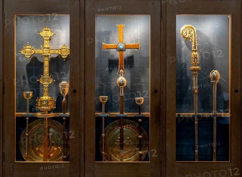 Chester, United Kingdom, 26 August, 2022: ornate golden crosses and Bishop staff in a display case inside the historic Chester Cathedral