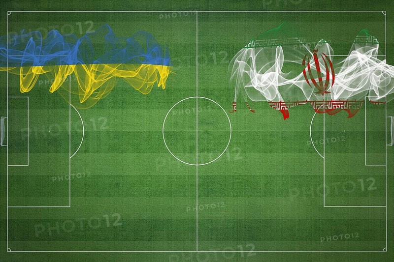 Ukraine vs Iran Soccer Match, national colors, national flags, soccer field, football game, Competition concept, Copy space