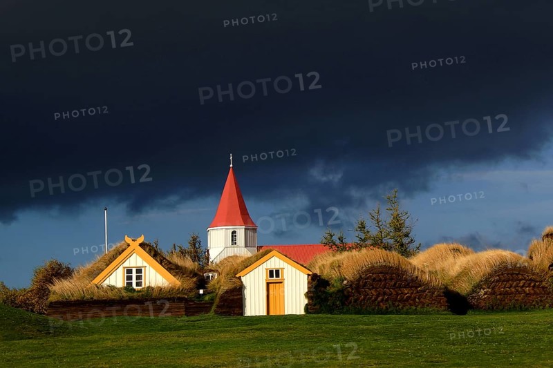 Iceland, Glaumbaer church and village view, Glaumbaer, Iceland