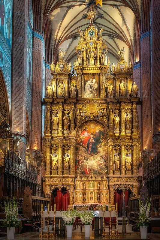 Closeup on amazing, golden and ornate altar of Church of the Assumption of the Blessed Virgin Mary, Cathedral Basilica in Pelplin, Poland