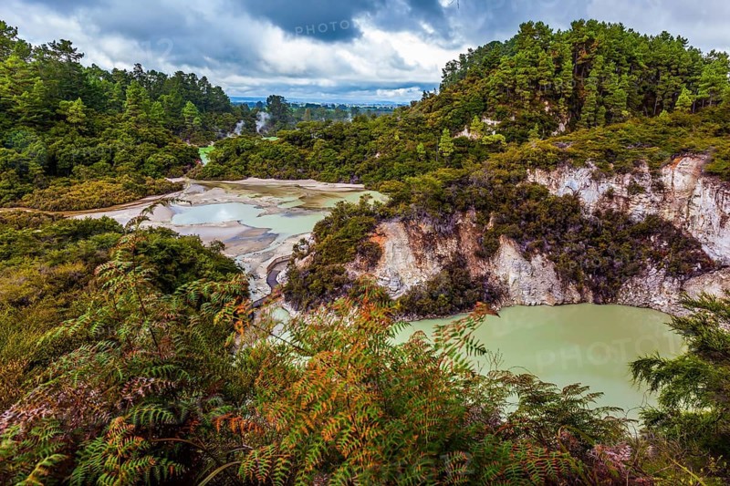 Thermal Wonderland is Wai - O - Tapu. Picturesque lake with green water. New Zealand, North Island. The concept of active and phototouris