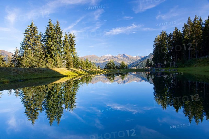 The lake on the top above alpine village of Alpbach and the Alpbachtal (Alpbach valley), Austria