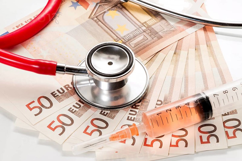 Stethoscope and syringe are on 50 euro notes