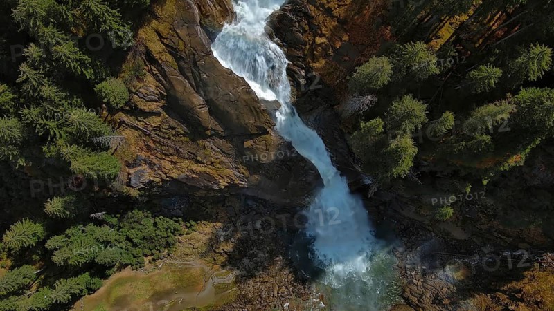 Aerial view of Krimml Waterfalls on sunny day. High Tauern National Park, Austrian Alps, Austria