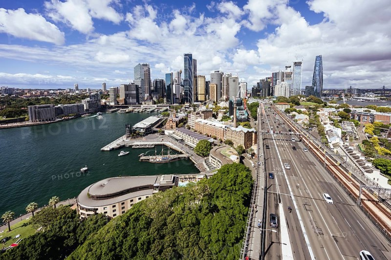 SYDNEY, AUSTRALIA, MARCH 4 2023: The Sydney CBD and surrounding harbour, including Circular Quay and The Rocks on a clear autumn day in Sydney, Australia