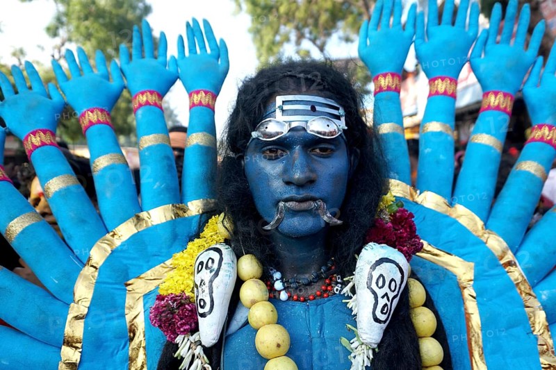 Man dress as Hindu Goddess Kali near Mutharamman temple, Tamil Nadu, India, Asia