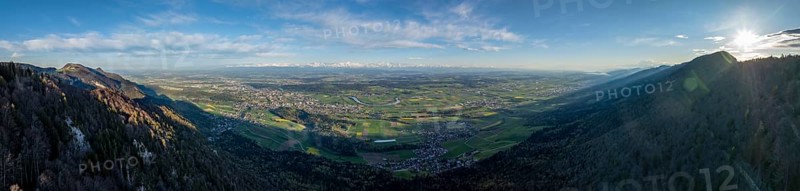 View of Mittelland with Aare loops and snow-covered Alps, Gitziflueh on the left and Hasenmatt on the right, drone image, first Jura chain, Solothurn, Switzerland