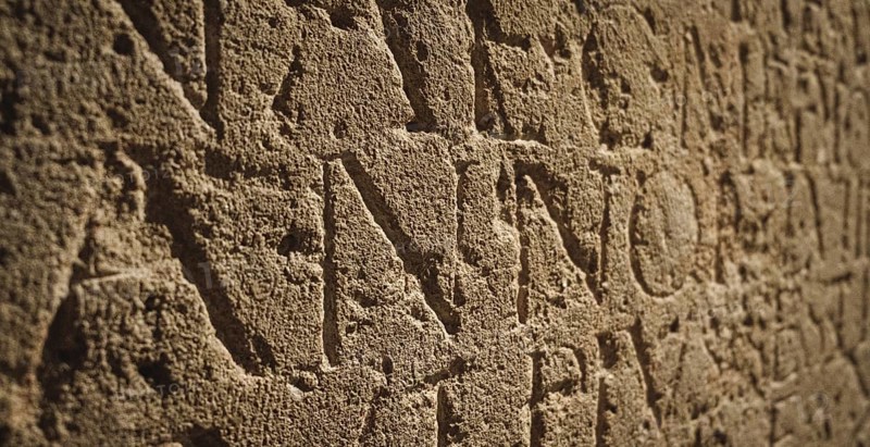 Roman inscription in stone in bath, united kingdom england