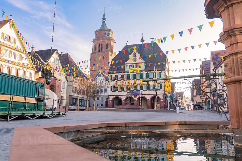 Lively town view with pennants and a bell tower in historical surroundings, Fasnet, Weil der Stadt, Böblingen district, Germany
