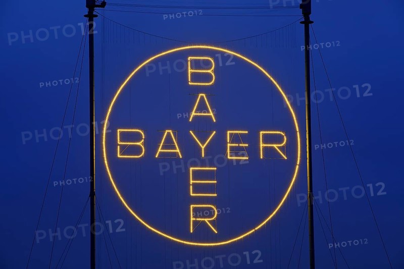Bayer Cross, the world's largest illuminated sign with 1, 710 LED lights in the evening, Bayer AG, Leverkusen, North Rhine-Westphalia, Germany