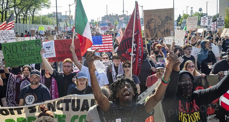 Detroit, Michigan USA - 14 June 2025 - Thousands gathered for a 'No Kings' rally, protesting President Trump's actions against immigrants and against democratic institutions. Afterwards they marched to the ICE office