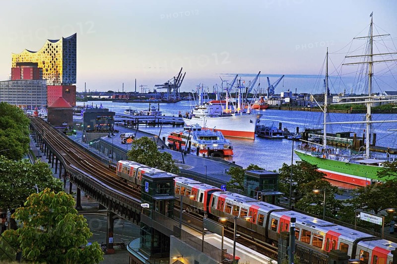 View of Hamburg harbour with museum ship Cap San Diego, elevated railway along the Elbe promenade and Elbphilharmonie concert hall, Germany