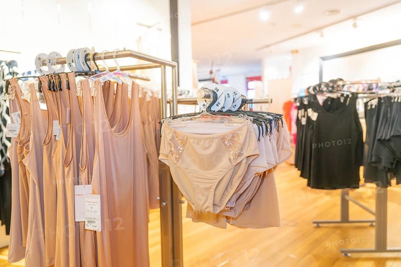 Women's underwear on clothes racks in a shop with wooden floor, Sindelfingen, Germany