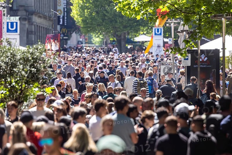 Many people on the way in the pedestrian zone Königsstraße. Crowd in Stuttgart, Baden-Württemberg, Germany