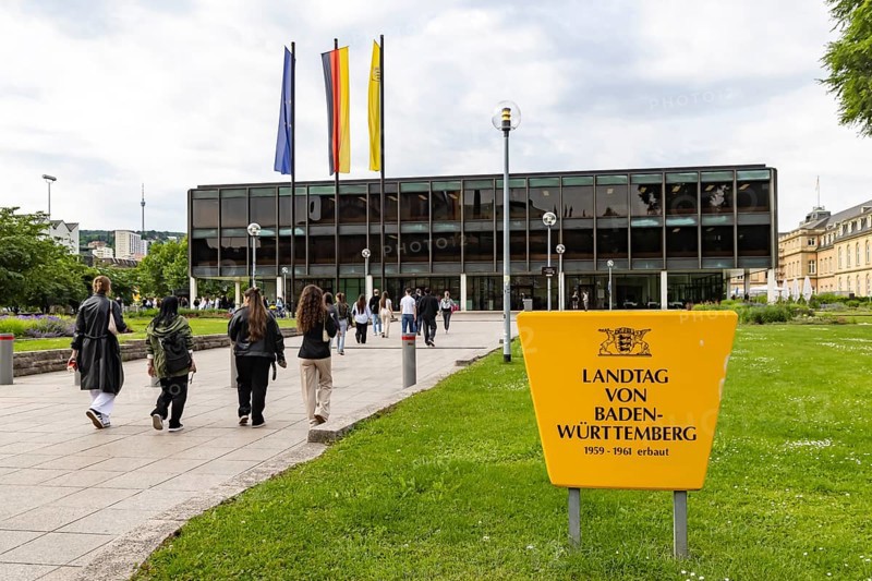 House of the state parliament of Baden-Württemberg, state parliament building in Stuttgart. Flags above the building on a session day. The Haus des Landtags was built between 1959 and 1961 according to a design by Kurt Viertel. From 2013 to 2016, the listed building was completely renovated and brought up to technical standards. Stuttgart, Baden-Württemberg, Germany