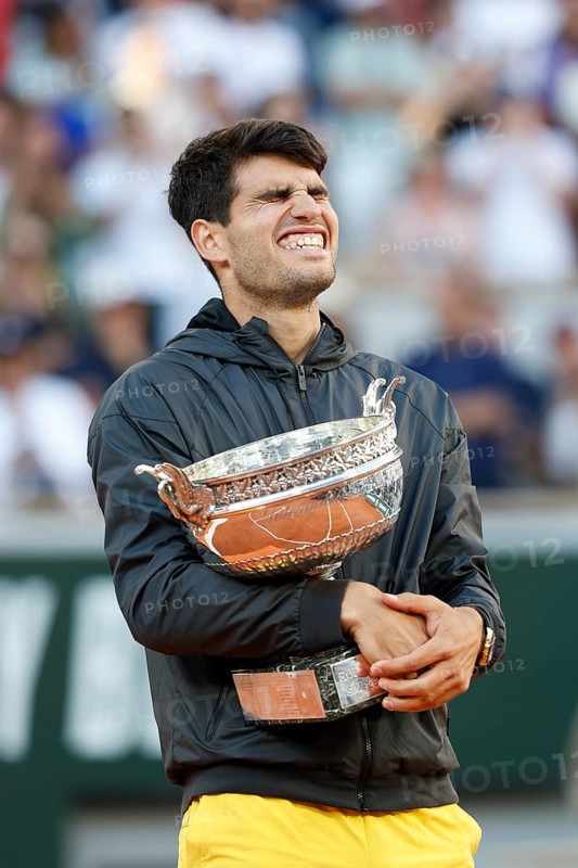 French Open 2024 winner Carlos Alcaraz with the trophy at Roland Garros, Paris, France.