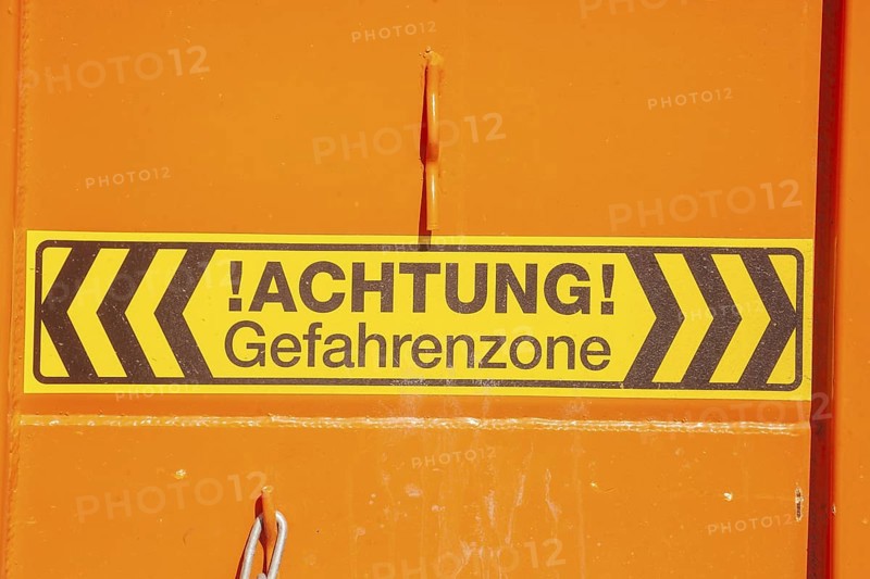 Caution danger zone sign at a construction site, Germany