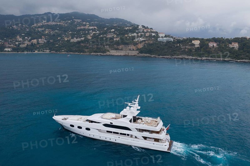 Aerial view 51 metre motor yacht ELENI cruising between Cap Martin and the Principality of Monaco, French Riviera, Mediterranean Sea