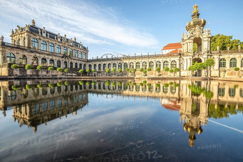 The Dresden Zwinger, a landmark of baroque architecture. Historic buildings in the style of a palace, orangery at sunrise in the morning in the city of Dresden, Saxony, Germany