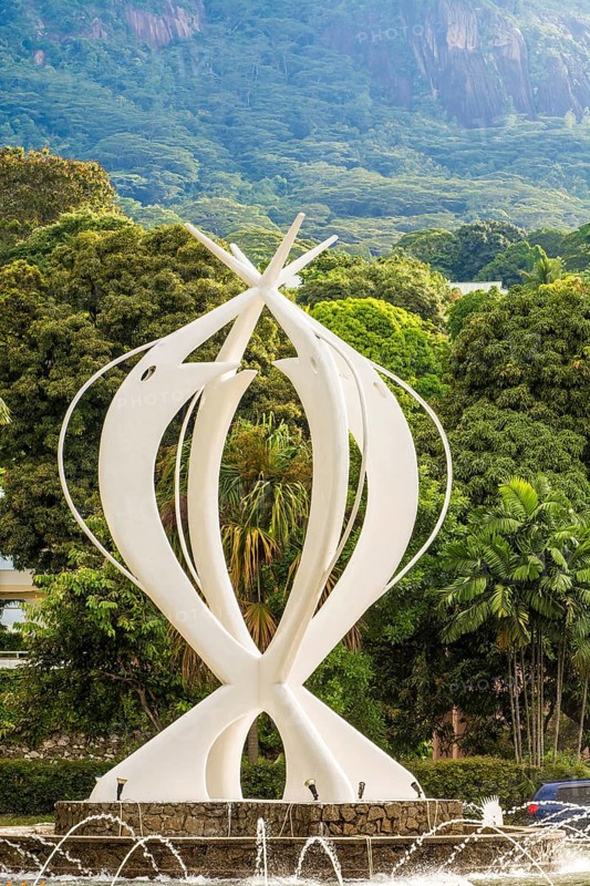 The monument de L'unite (Monument of National Unity) in downtown Vicoria, mahe, Republic of Seychelles, Indian Ocean