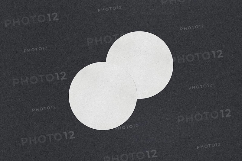 Two overlapping textured white circles on a dark background, minimalistic art, Blank white Business card mockup stacks at grey textured paper background