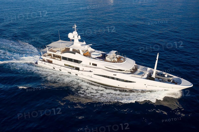 Aerial view of 55-metre motor yacht HALO, delivered in 2018 by the Dutch shipyard Amels, cruising off the Principality of Monaco, French Riviera, Mediterranean Sea