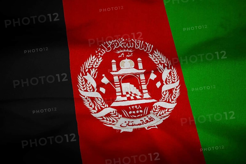 Ruffled Flag of Afghanistan Blowing in Wind