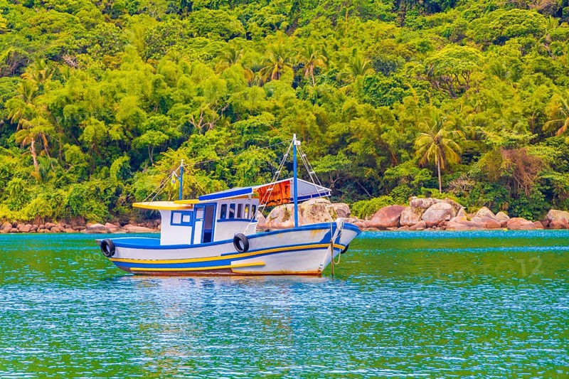 Boats ships and Boat Mangrove beach and Pouso beach Ilha Grande Angra dos Reis Rio de Janeiro Brazil