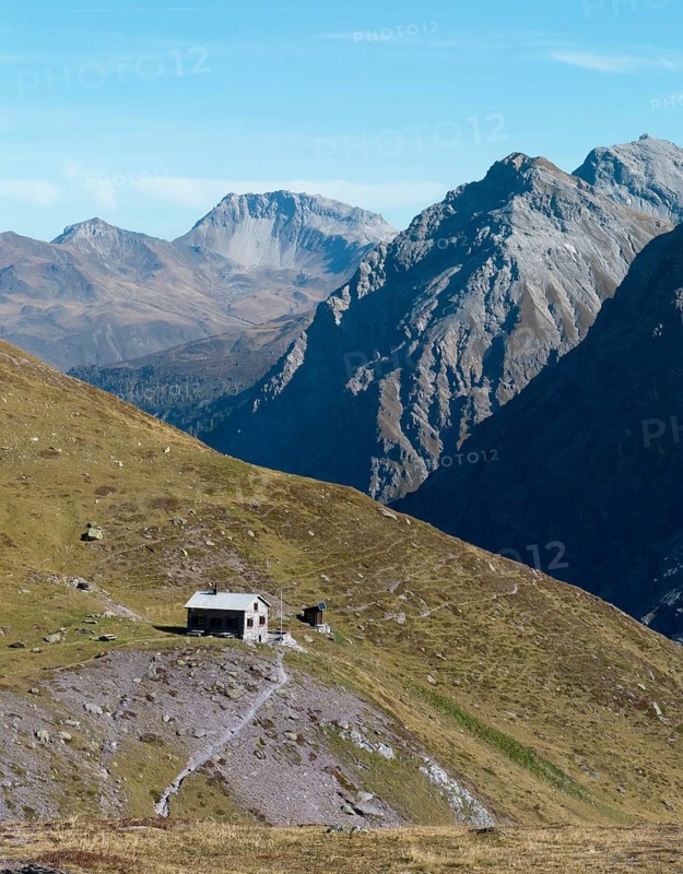 Ramozhütte SAC, Davos mountains in the back with Weissfluh peak, drone shot, Welschtobel, Arosa, Grisons, Switzerland
