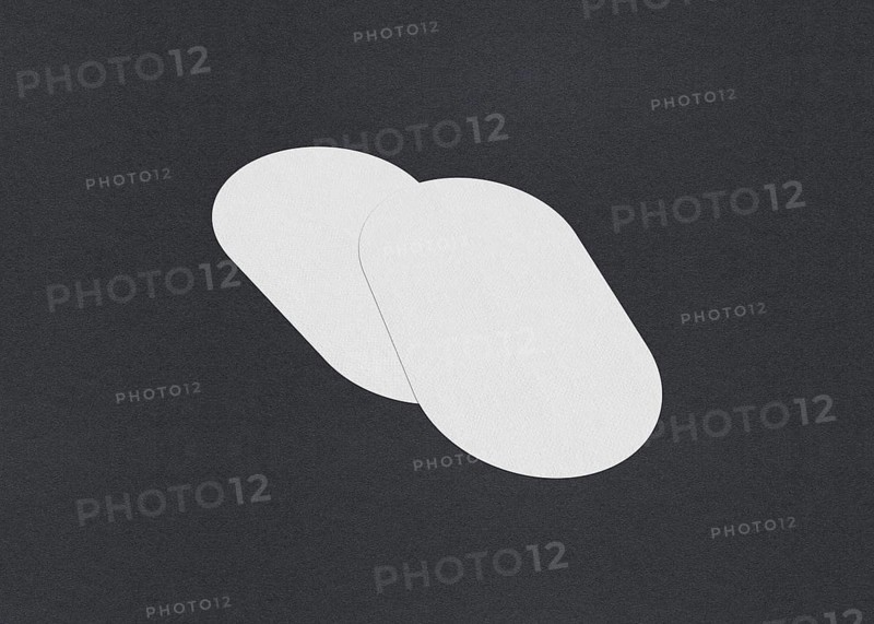 Two white ovals slightly overlapping on a gray background, minimalistic abstract design, Blank white Business card mockup stacks at grey textured paper background