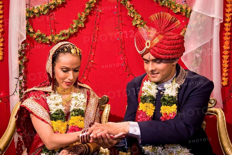 Indian bride and bridegroom holding hand performing vidhi in marriage ceremony MR Bridegroom#729E, NO MR Bride