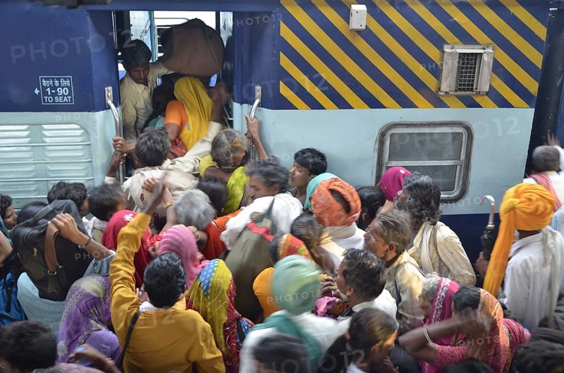 Peoples trying to board in coach of train at Jodhpur Rajasthan India Asia