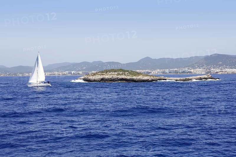 Ibiza mediterranean island blue seascape with rocks