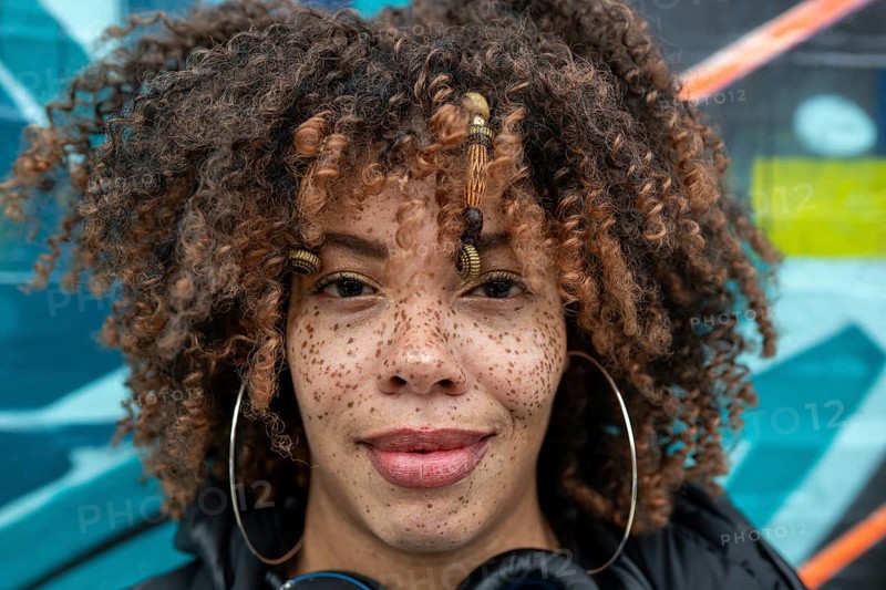 Close up portrait of woman with freckles