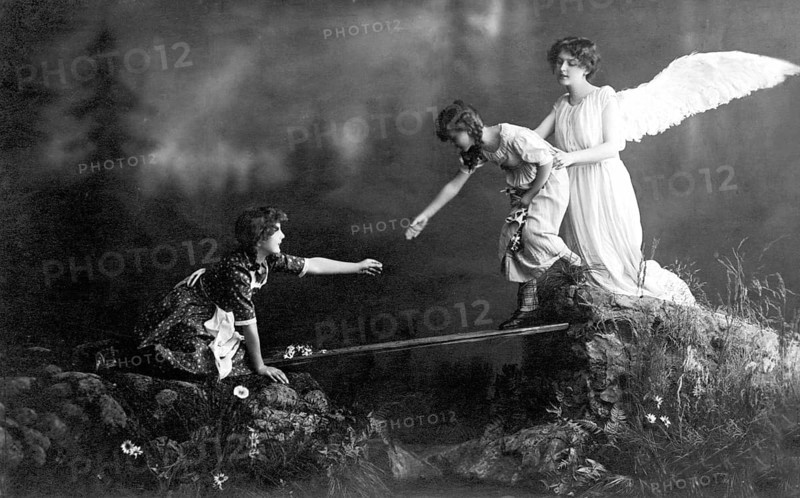 Guardian angel angel, 1930s, Angel helping a child while a woman watches from a rock, historical photo