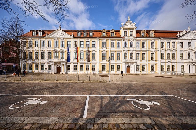 State parliament, historic houses, baroque architectural style, facade, window, disabled parking space, bollards, cobblestone roadway, deep blue sky, cumulus clouds, cathedral square, Magdeburg, state capital, independent city, Saxony-Anhalt, Germany
